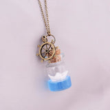 Glowing Ocean Blue Paper Boat Necklace