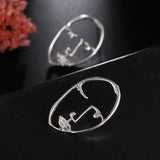 Abstract Hollow Out Face Drop Earrings