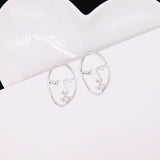 Abstract Hollow Out Face Drop Earrings