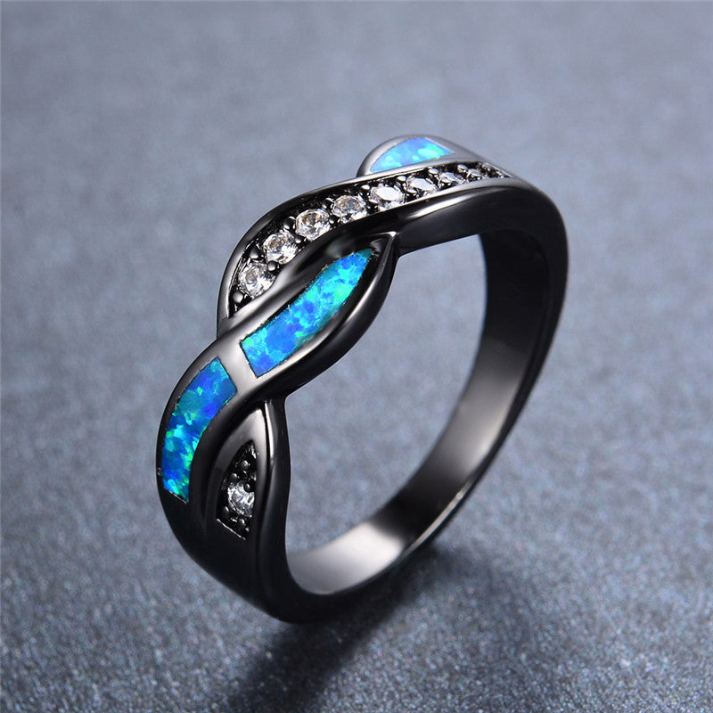 Blue Fire Opal Black Gold Ring | Floral Fawna